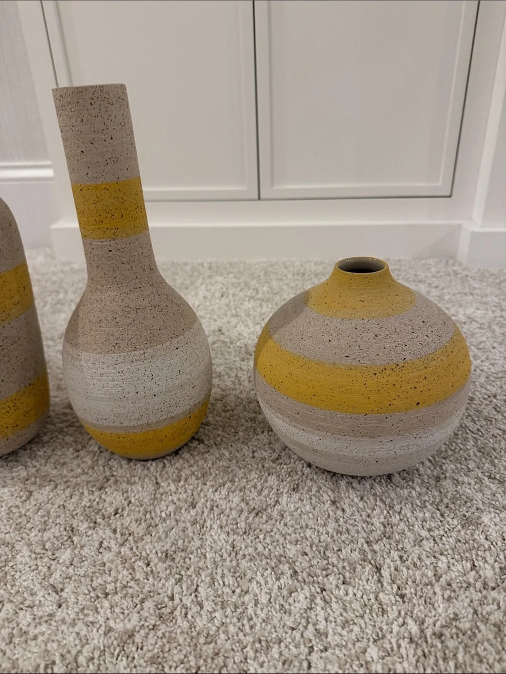 West Elm striped vases - yellow/white. Natural base. Like new!
